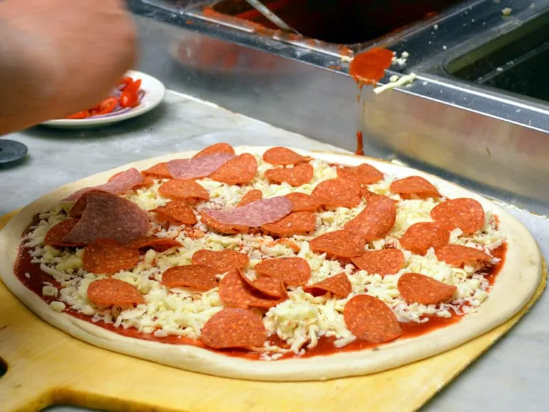 Pizza being made fresh