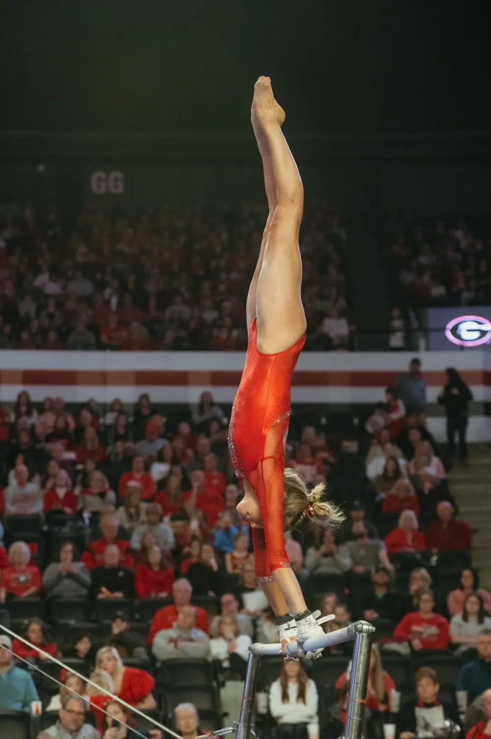 Gymnast on bars